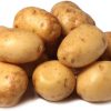 a small pile of 'Kennebec' potatoes on a white surface